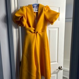 Selling three wedding dresses. Black, purple and Orange.